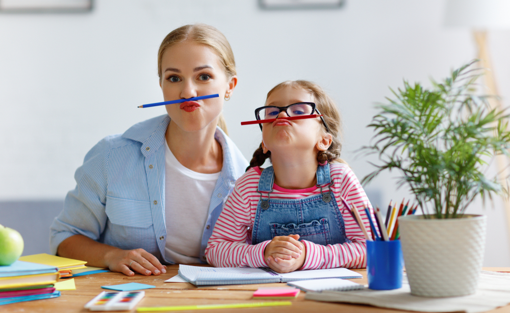 mom homeschooling her daughter